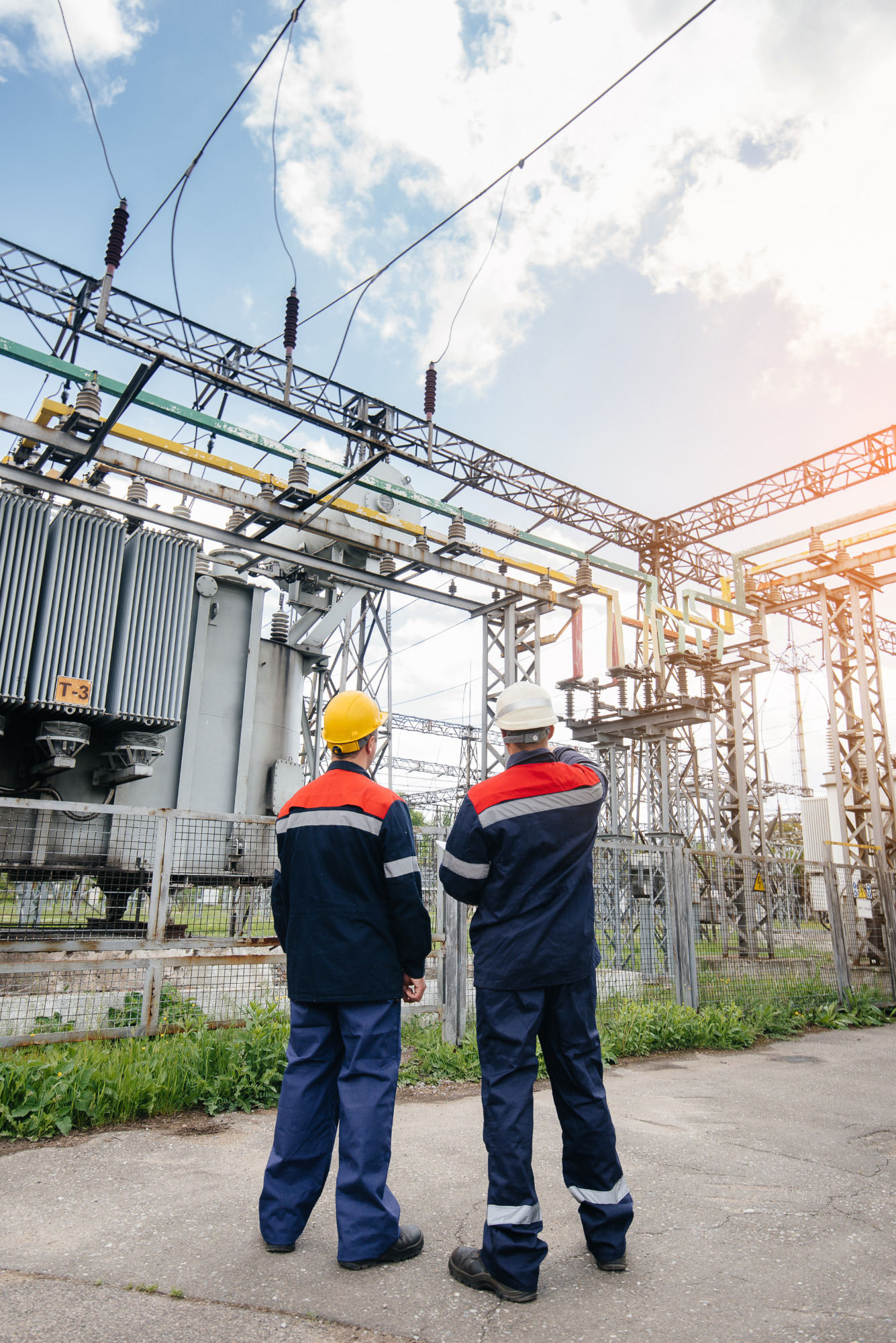 Electrical worker inspecting power infrastructure